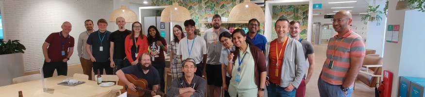 Liverpool Hope University Computer Science graduate, Daniel Swarup (centre, white t-shirt) at an Amazon event.